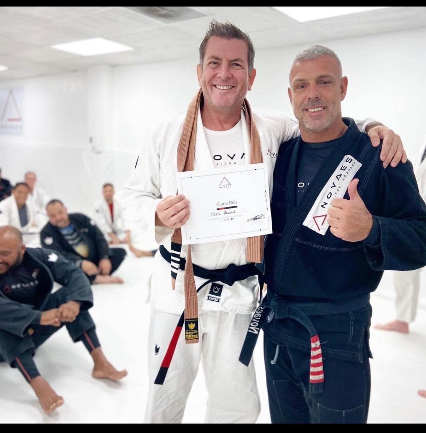 Chris Howard with Black belt